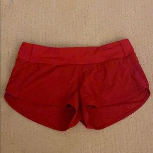 Red lululemon 2.5’ speed up shorts